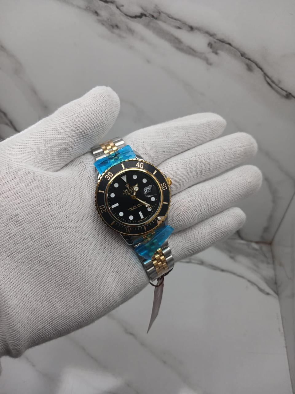 Two-Tone Diver-Style Quartz Watch with Date Display and Rotating Bezel