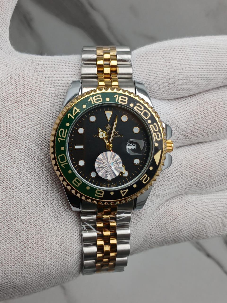 Two-Tone GMT-Style Luxury Wristwatch with Green & Black Bezel