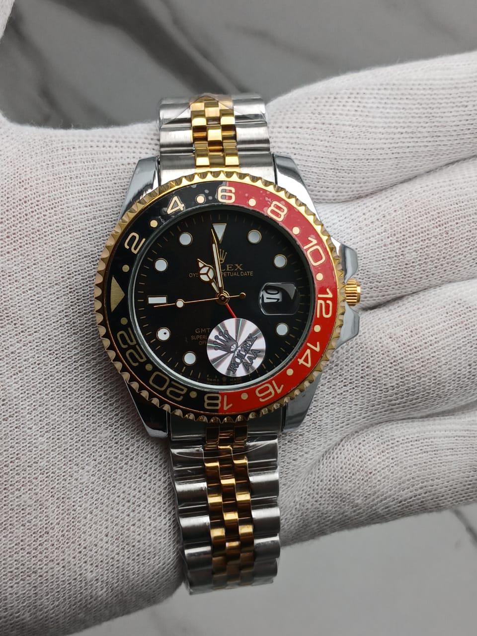 Two-Tone GMT-Style Luxury Wristwatch with Green & Black Bezel